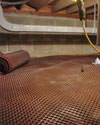 Crawl space drainage matting installed in a home in Grimes