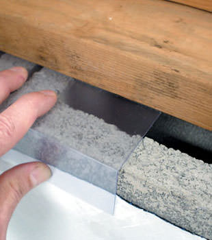 Block wall clear covering for wet crawl spaces in Newton
