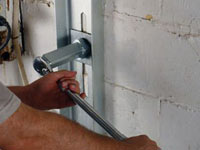 Mounting a foundation wall channel anchor in Marshalltown.