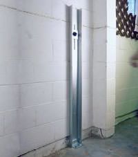 A failing foundation wall repaired with a foundation wall channel anchor system in a Urbandale home.