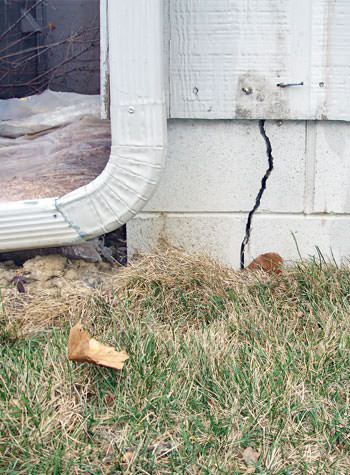 foundation wall cracks due to street creep in Chariton