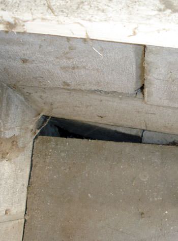 inward rotation of a foundation wall damaged by street creep in a garage in Osceola